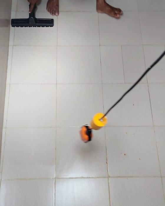 Underground water tank floor after final vacuum pass, ready to refill, in Kalighat, Kolkata