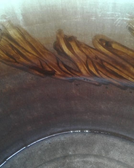 Rust flaking off the inside wall of a home water tank