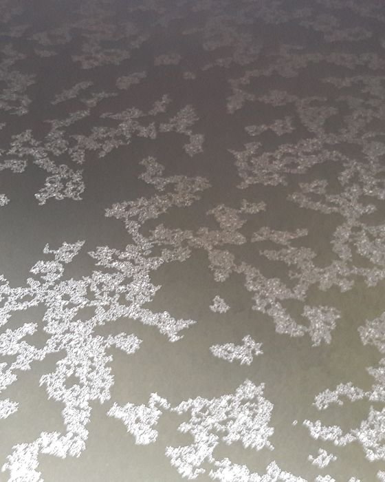 Mineral deposits coating the ceiling of a water tank